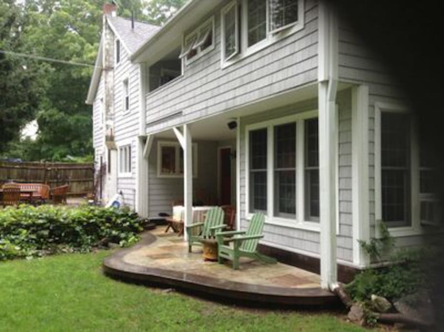 Lower patio with sheltered dining area