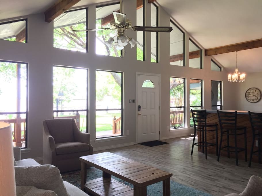 Main living area, open to the kitchen and views of the lake