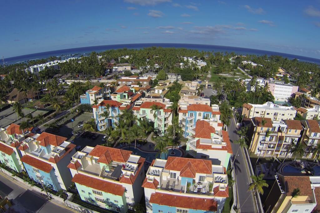 Drone view of Palm Suites, Cortecito and the ocean. The F Building is in the bottom right of the photo. We own the entire 3rd and 4th floors of the building.