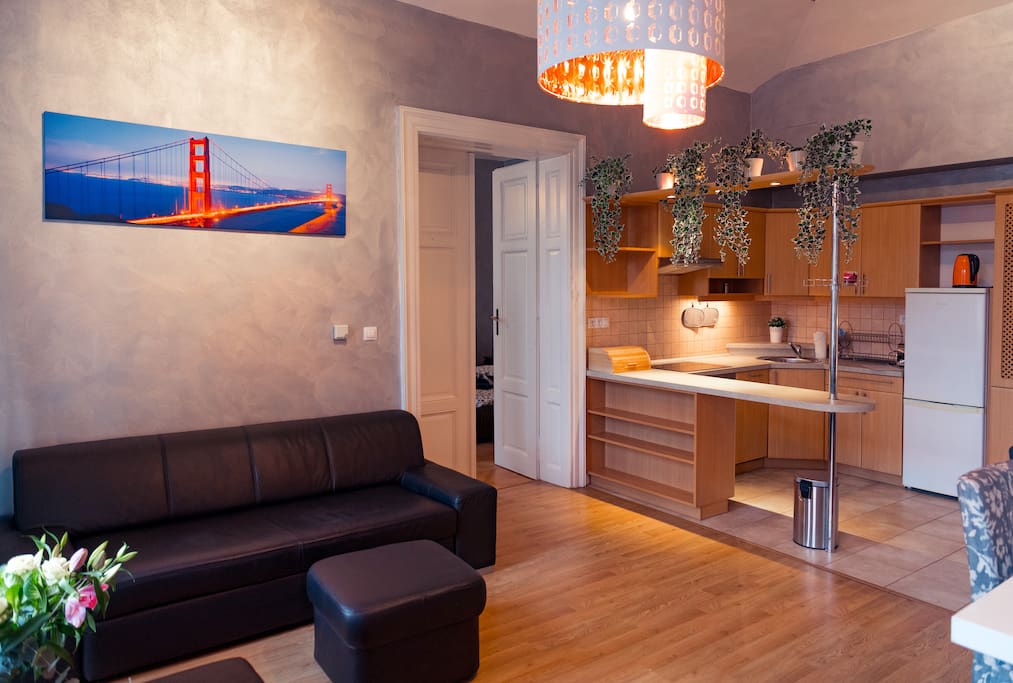 View Living room + kitchen
