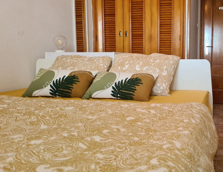 Bedroom 1: The bedroom has a built-in wardrobe, dresser, stool, and double bed 200x160 cm. There's a hanger on the door for hanging clothes or towels. The flush window faces the patio, so you have direct contact with the sea, the view of the waves, and you can hear the noise.