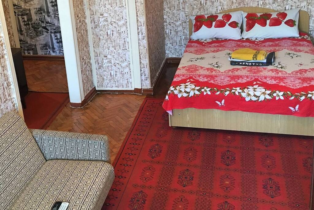 bed and sofa + 2 TV