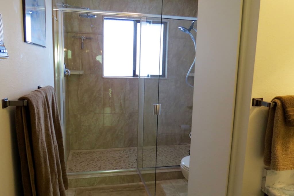 Tamarack's bathroom is across the hall. It includes a walk-in shower with two rain-shower heads and a heated floor!