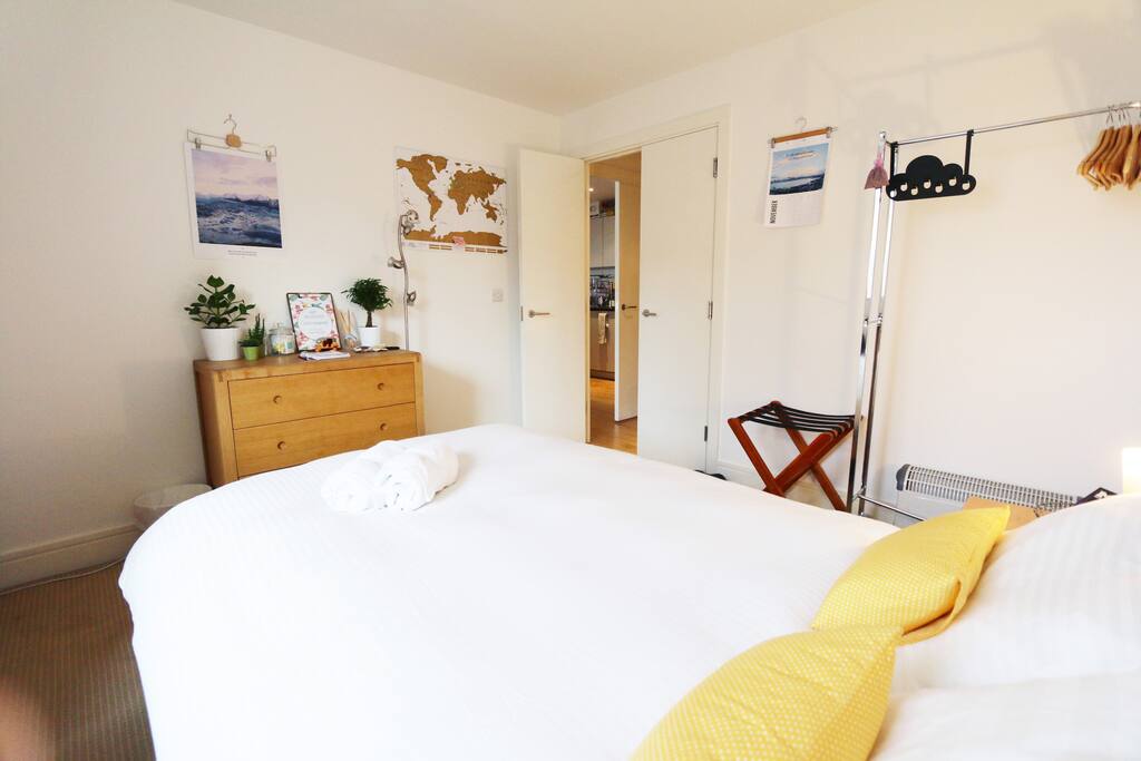 Double bed with luggage rack and clothes space