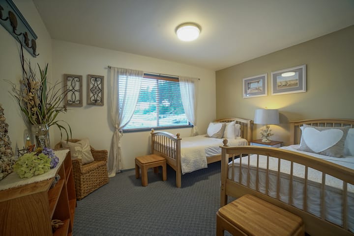 Twin Bedroom in Sauna House, window looks out over the Harbor