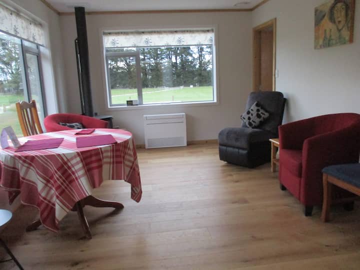 Small living area with TV made available for long term stays (5+ days).