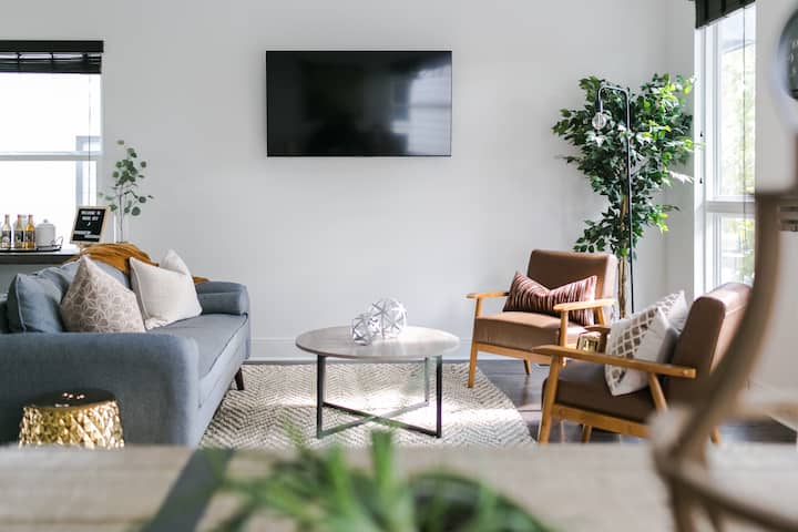 Main open concept living area. The TV in the living room and the bunk room have access to cable via YouTube TV as well as streaming services