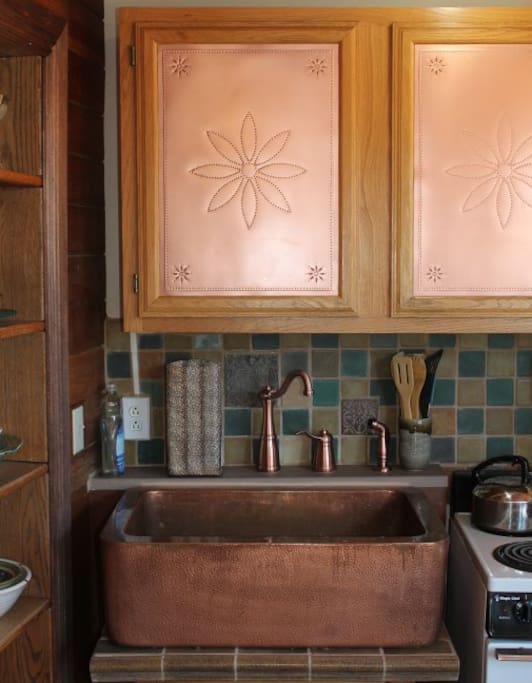 Close-up of copper farm house sink