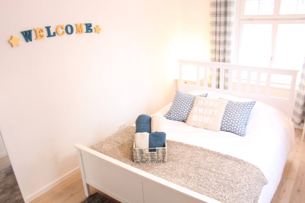 Large bed in bright room #2