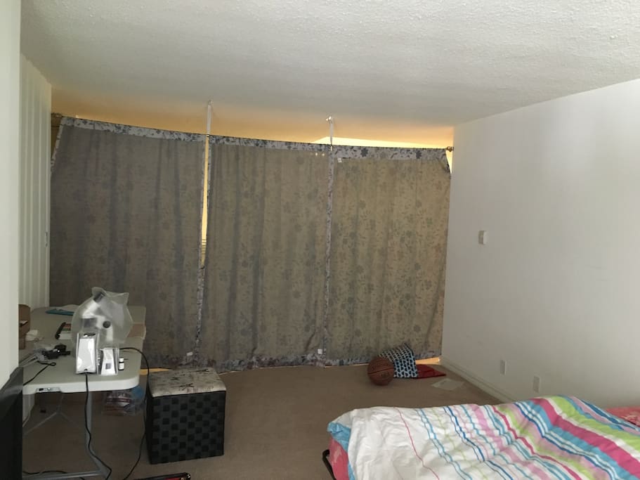 Spacious living room with partition