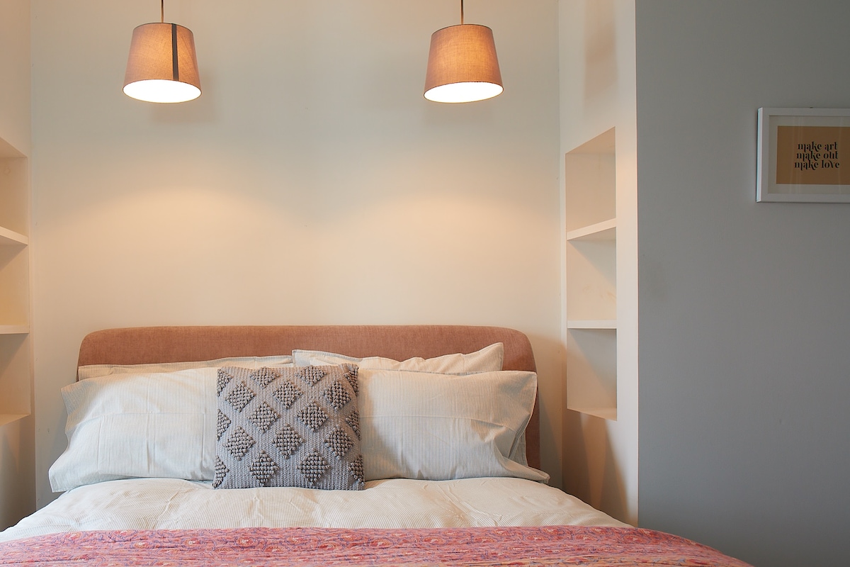 Primary Bedroom with Brooklinen bedding 