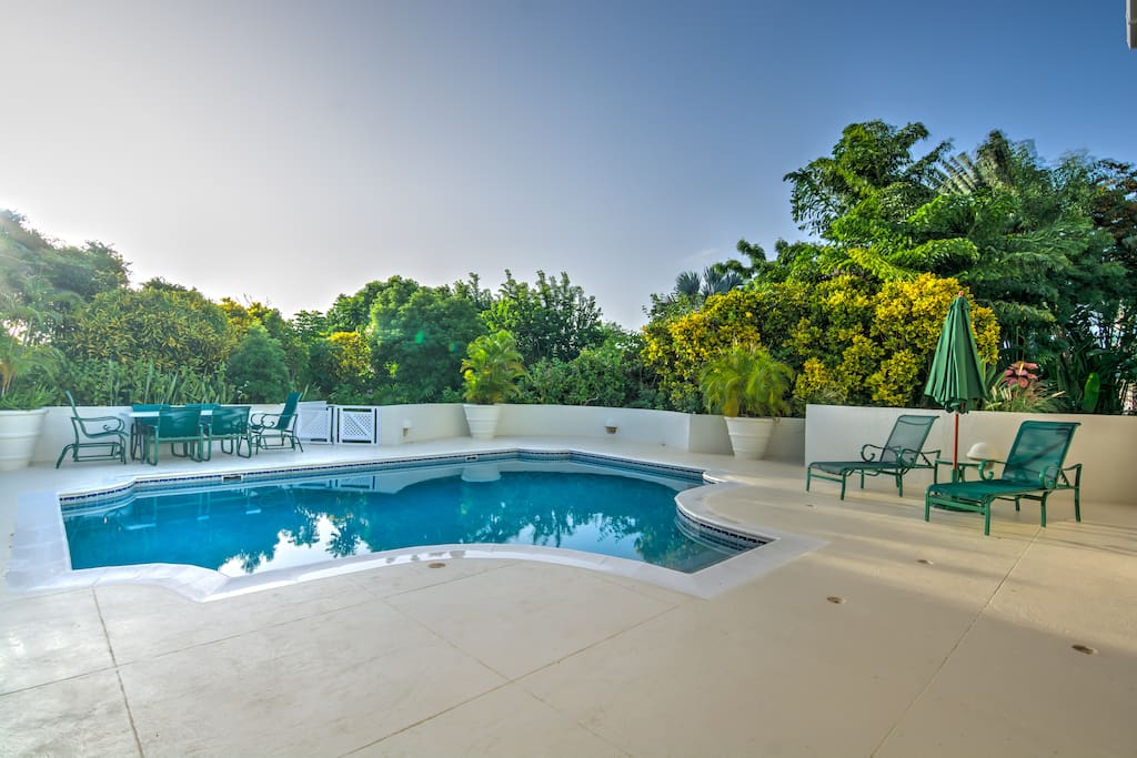 The private pool in the early evening as the sun begins to set.