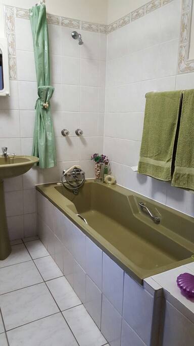 Bathroom with shower and bath