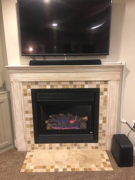 Large entertainment system and fireplace all to yourself!