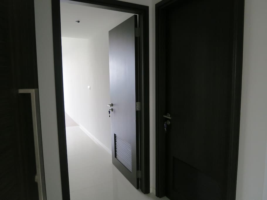 The closed door on the right leads to our unit, the open door leads to yours!