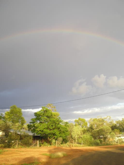 The Rock Shack with a the rainbow overhead.