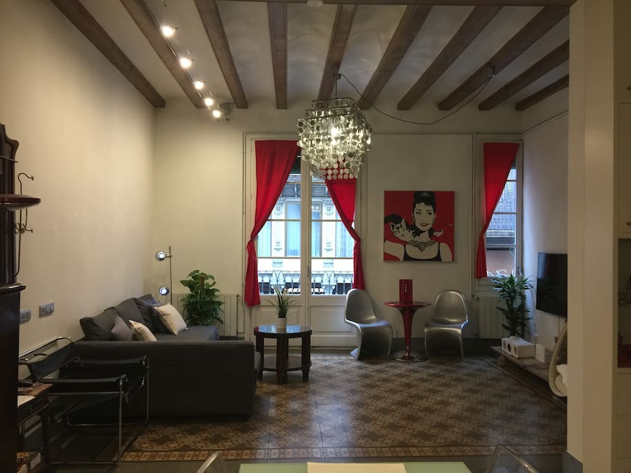 HUTB-000166. A comfortable living room with a nice balcony overlooking the popular street Ferran