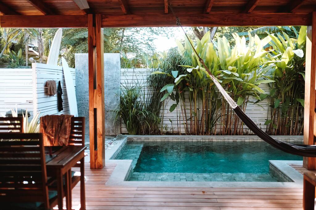 Hang out in the shade on the roofed patio.