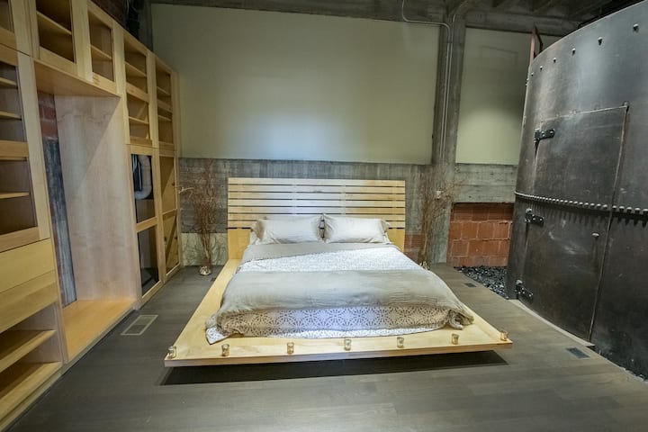 Master bedroom with en-suite bathroom door.