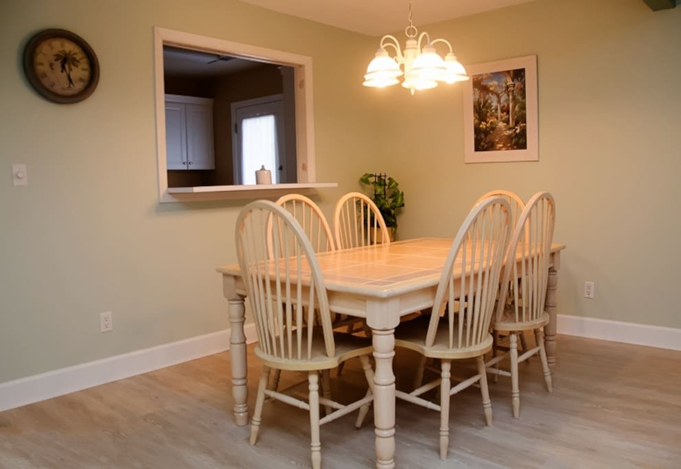 Dining seats 6 and is open to the living room.