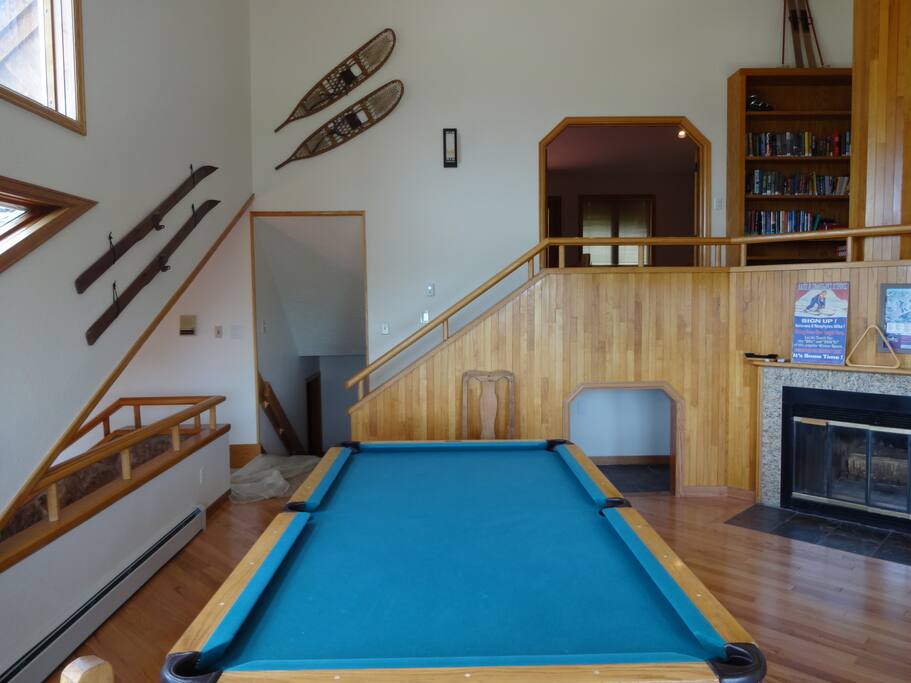 game room, pool table and video game console
