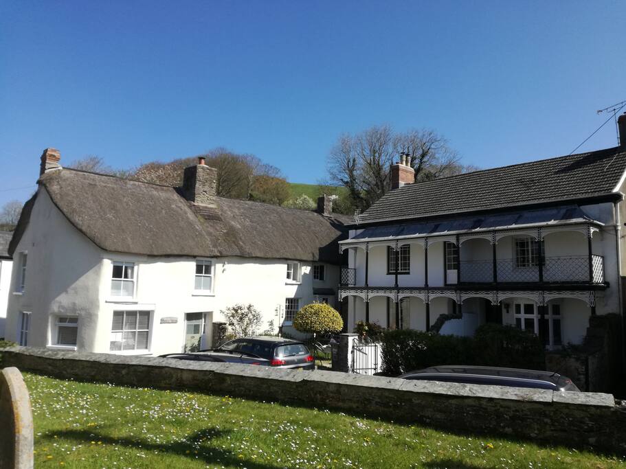Nestled amongst the parish church & thatched cottages