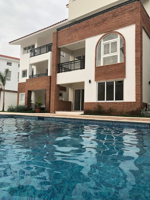 A stunning poolside view of Coral Village