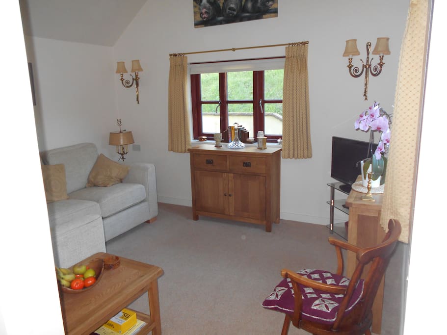 There is a large comfortable sofa in the lounge which converts into a 4' sofabed