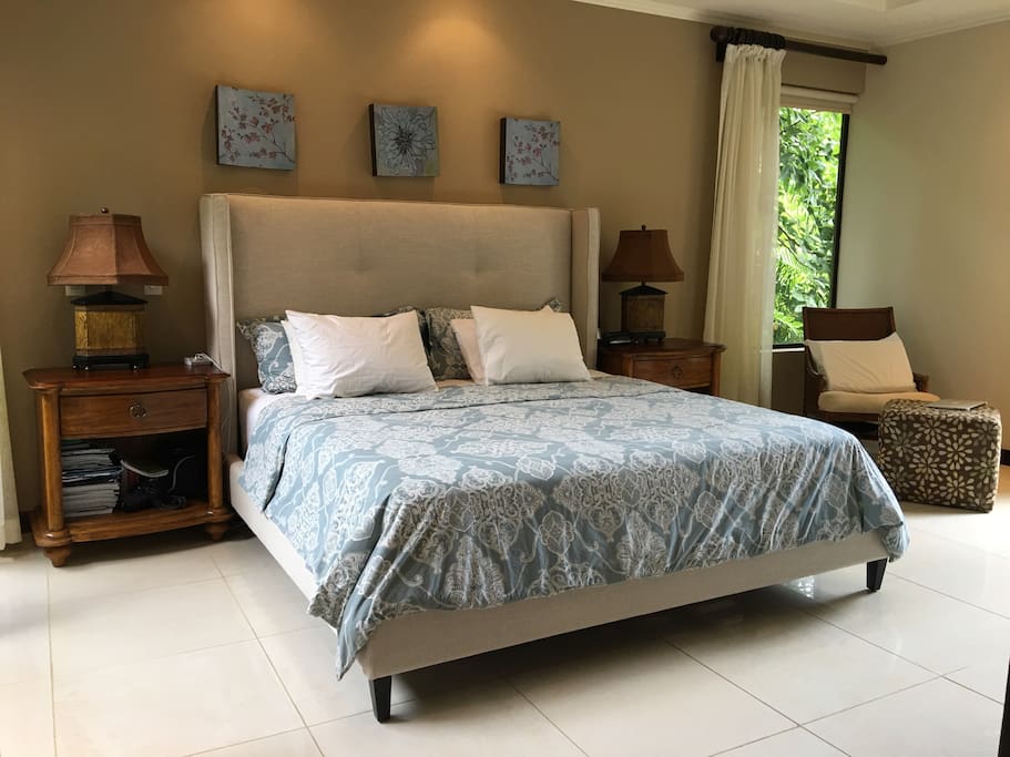 Upstairs Master Bedroom with King Bed and full ensuite bathroom.