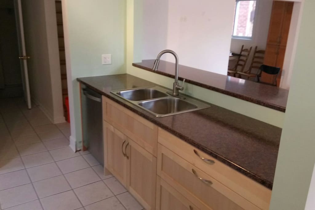 Kitchen sink and view of the bar.