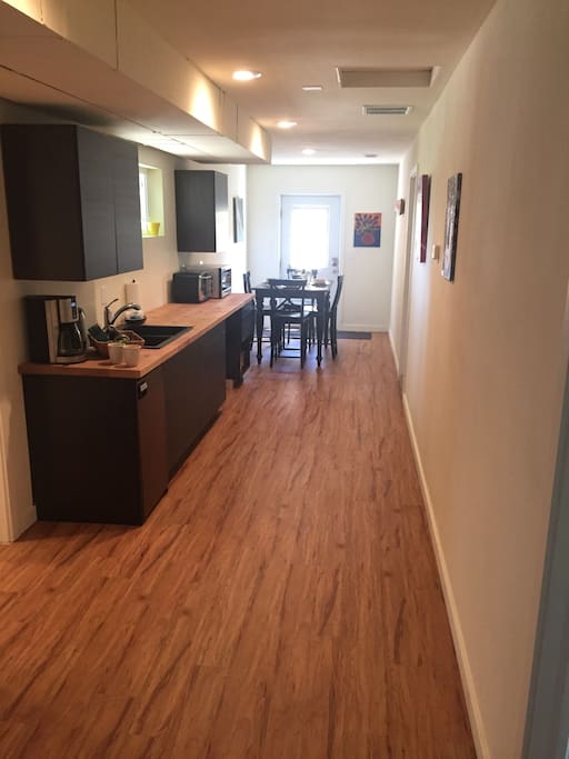 Kitchenette includes: mini-fridge, microwave, toaster/mini convection oven, electric griddle for eggs/pancakes, coffee maker, and dining area. This entire house has central air conditioning and heat.
