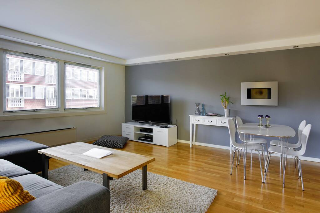 Spacious lounge area with 55" TV. There's also room for a Queen-sized inflatable bed here.
