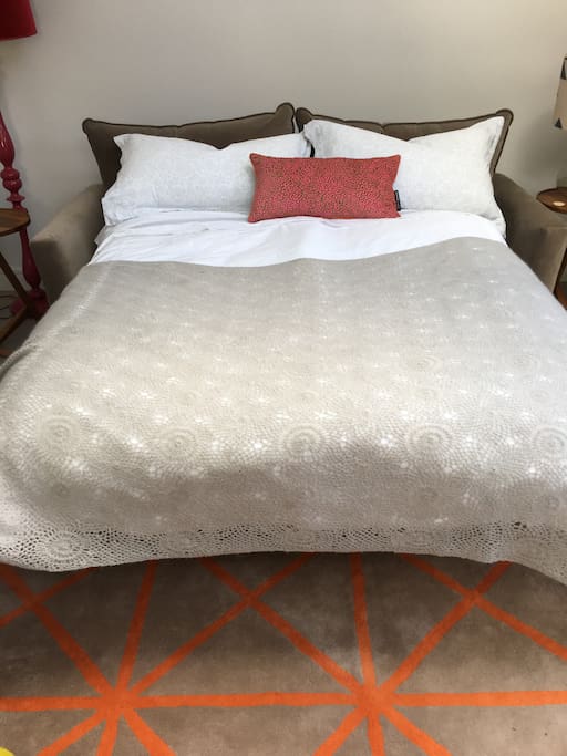 Pull out sofa bed with luxury mattress pad