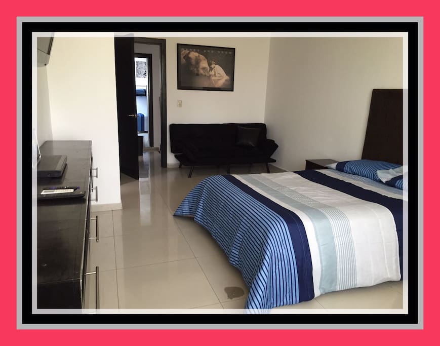 Principal Bedroom, with Air Conditioner, walking in Closet, privated Bathroom and Sofa Bed.