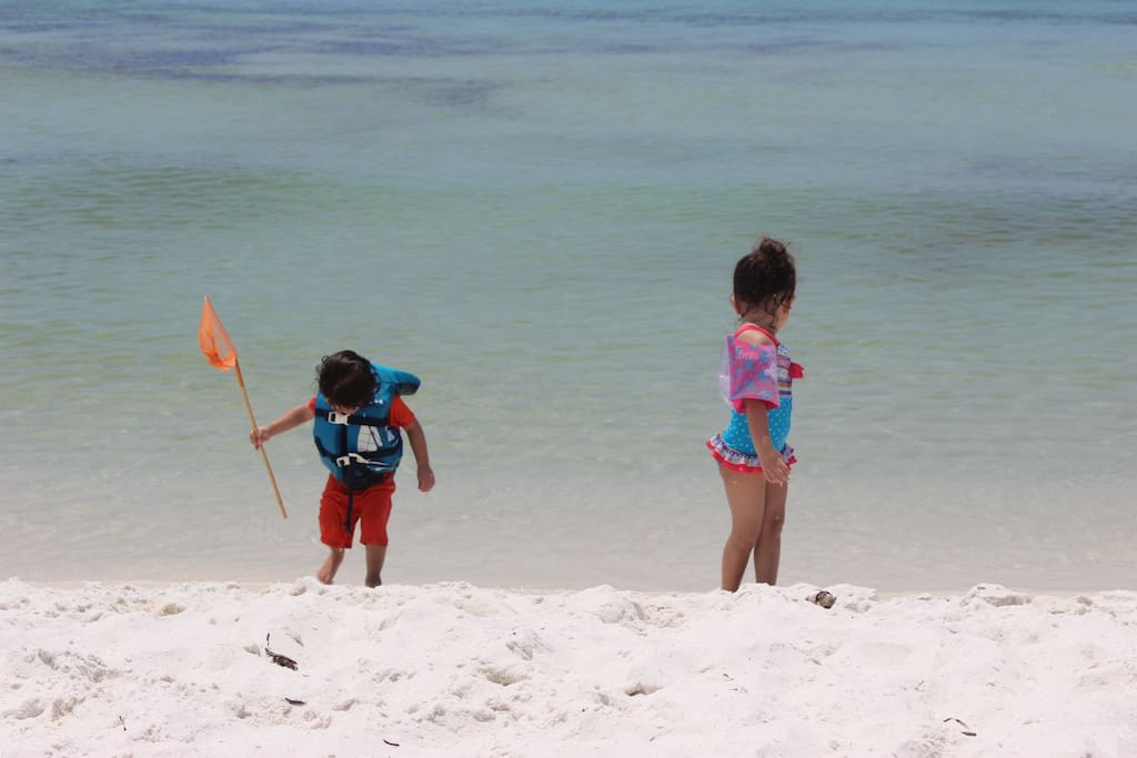 Twins playing on the Gulf