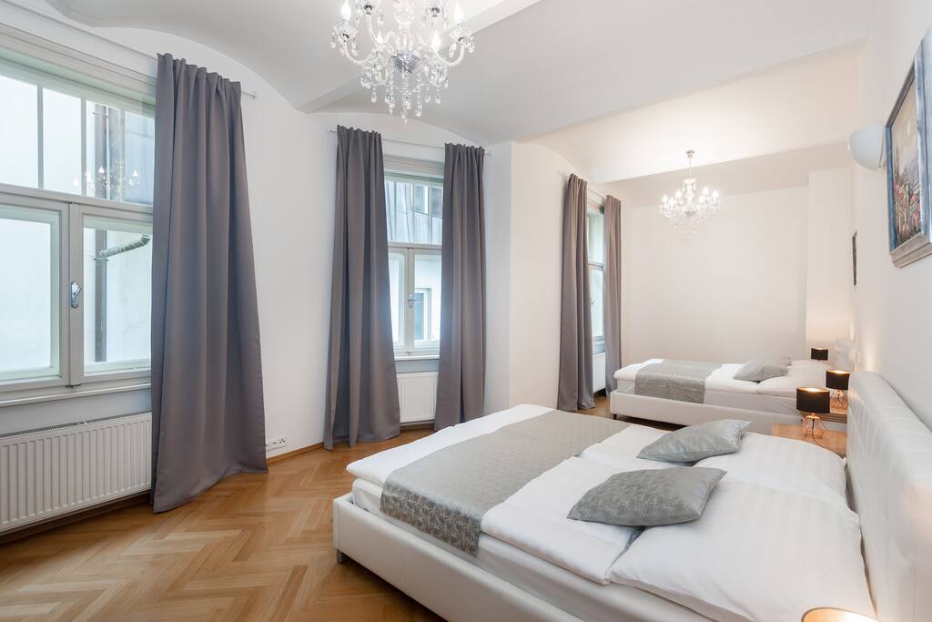 Bedroom with 1 King and 1 Queen Sized Beds