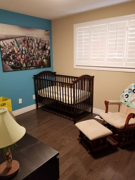 Nursery - can replace with air mattress if crib not needed.