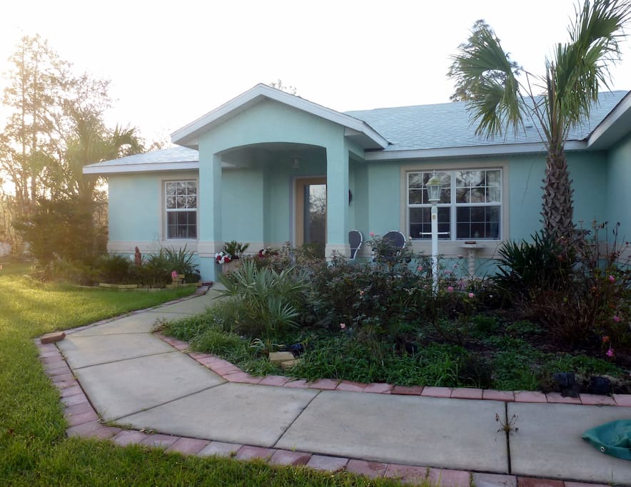 2007 modern concrete block/stucco home on acre lot in countryside. Smoking on shaded front paved patio only