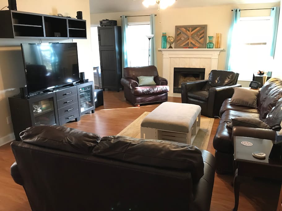 Living room - sofa, loveseat, two large chairs, 60" HDTV with cable & roku