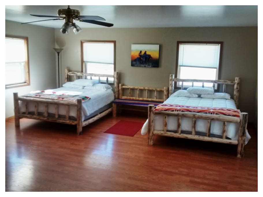 Bedroom has two queen beds, Private entry, TV and Private Bathroom.
