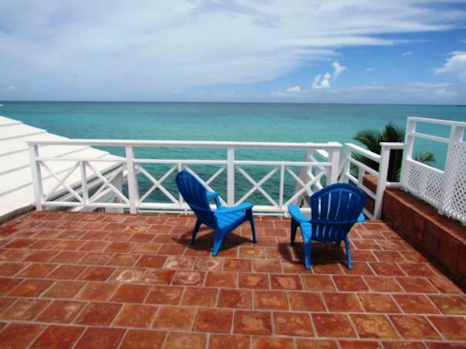 3rd story private roof terrace- no better place to watch the sunset and hear the waves lapping in