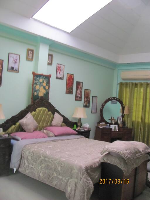 Newly decorated bed background showing the skylight which now has insulated blinds for daytime