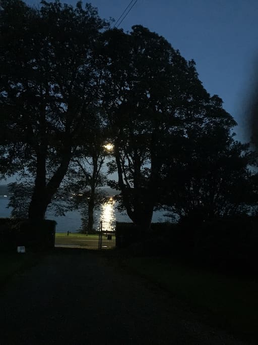 Looking down toward our gates and the water, at night