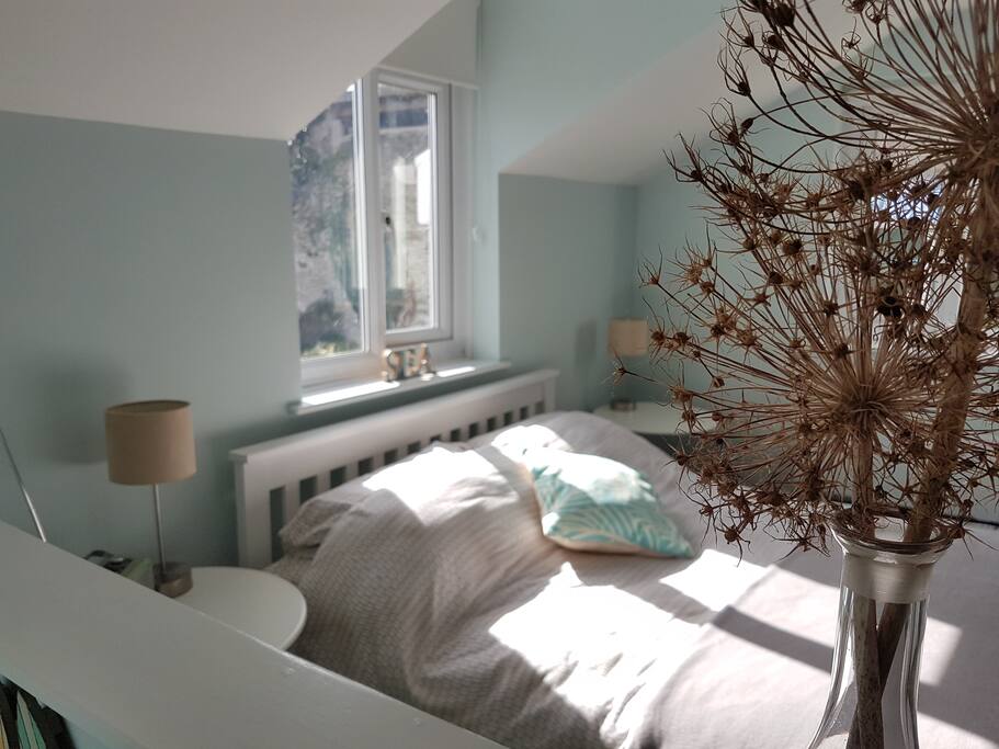 A light and airy room with views over the rooftops and across the Taw estuary