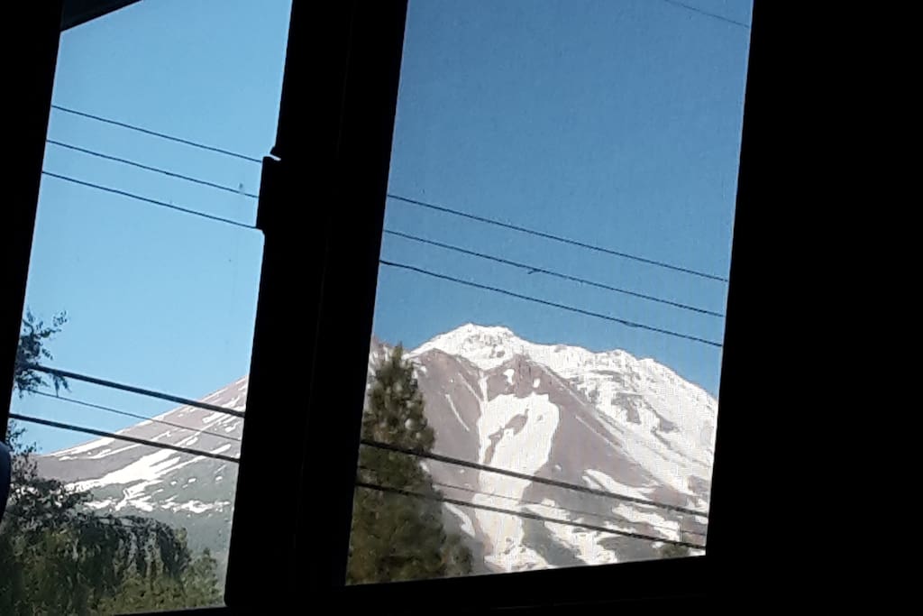 View of Mt Shasta laying in bed