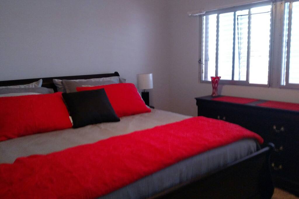 King size bed. Bathroom to the left.