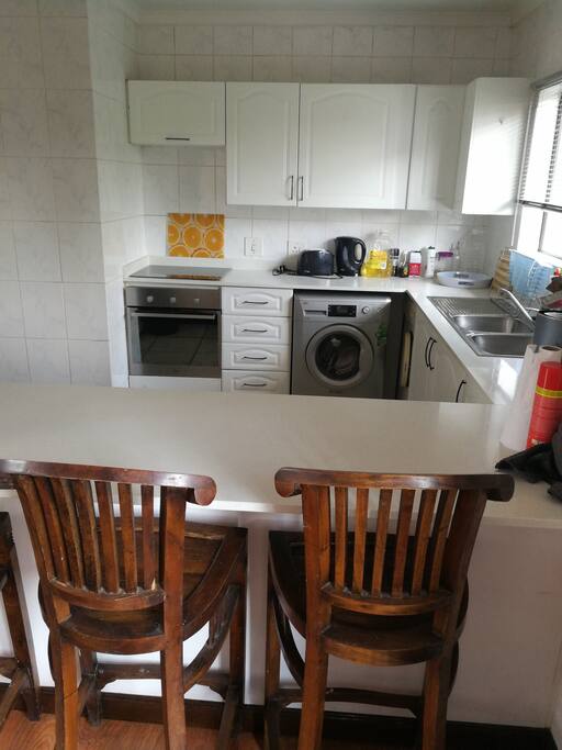 Quartz Countertops. Washing Machine & Dryer