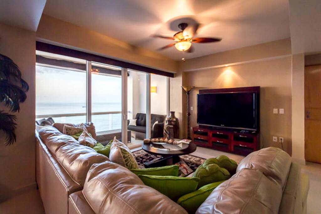 Wind down for the day watching a movie on the large screen TV