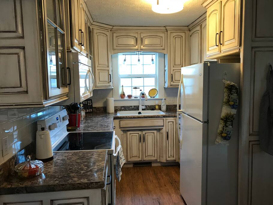 The kitchen is fully stocked with pots, pans, china and kitchen gadgets. Just bring your food and start cooking!