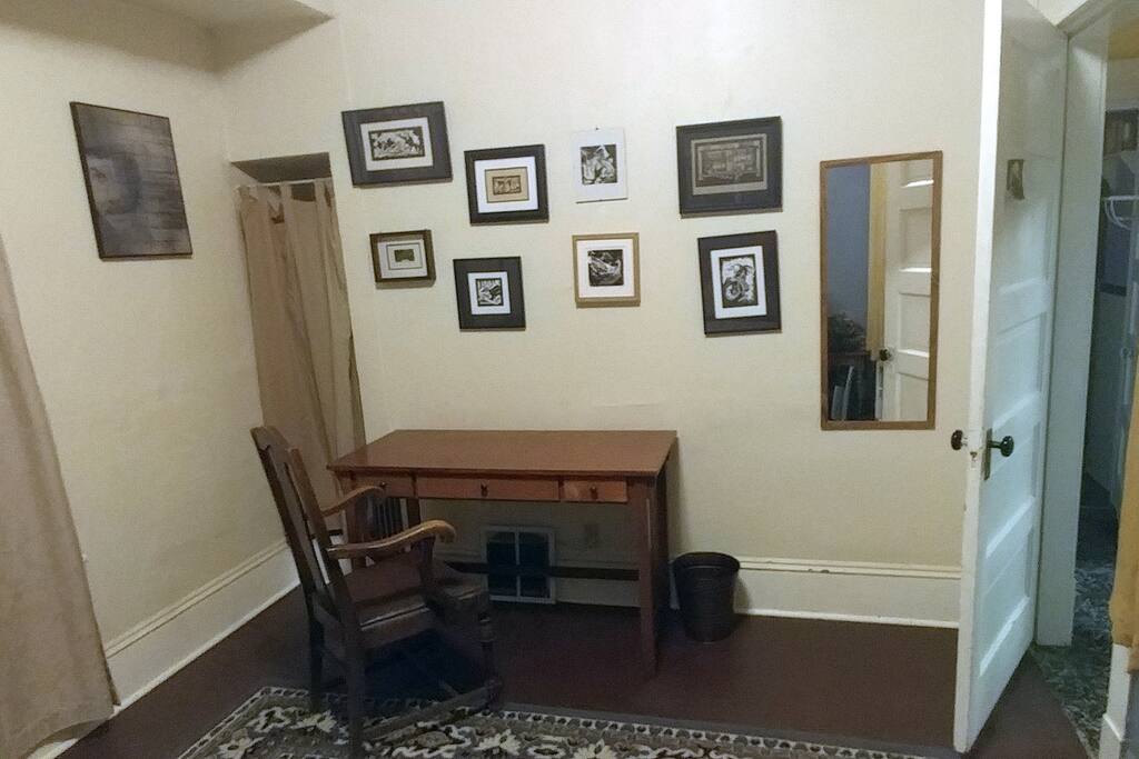 Desk, nook, mirror, and wall art (local artist)!